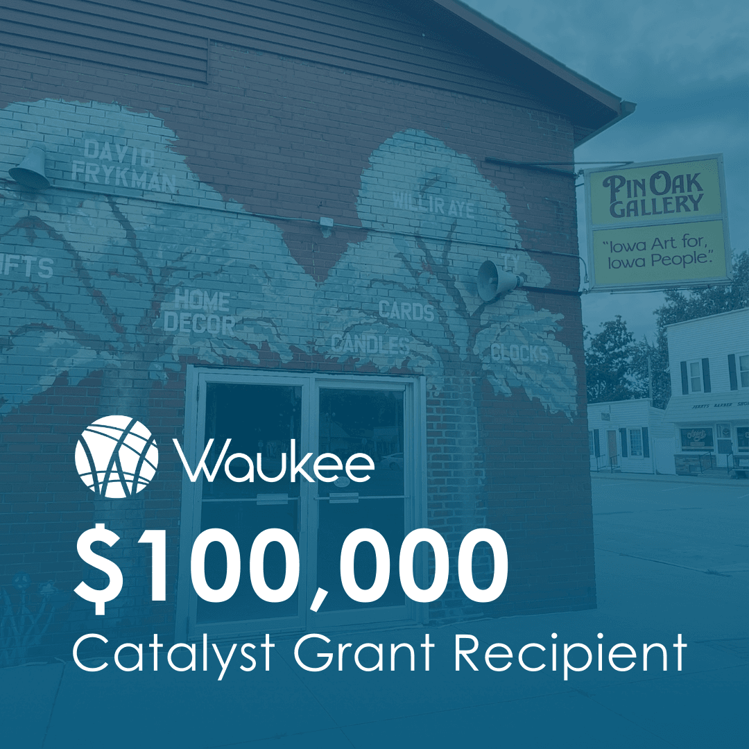 picture of brick building with tree mural overlayed with teal blue