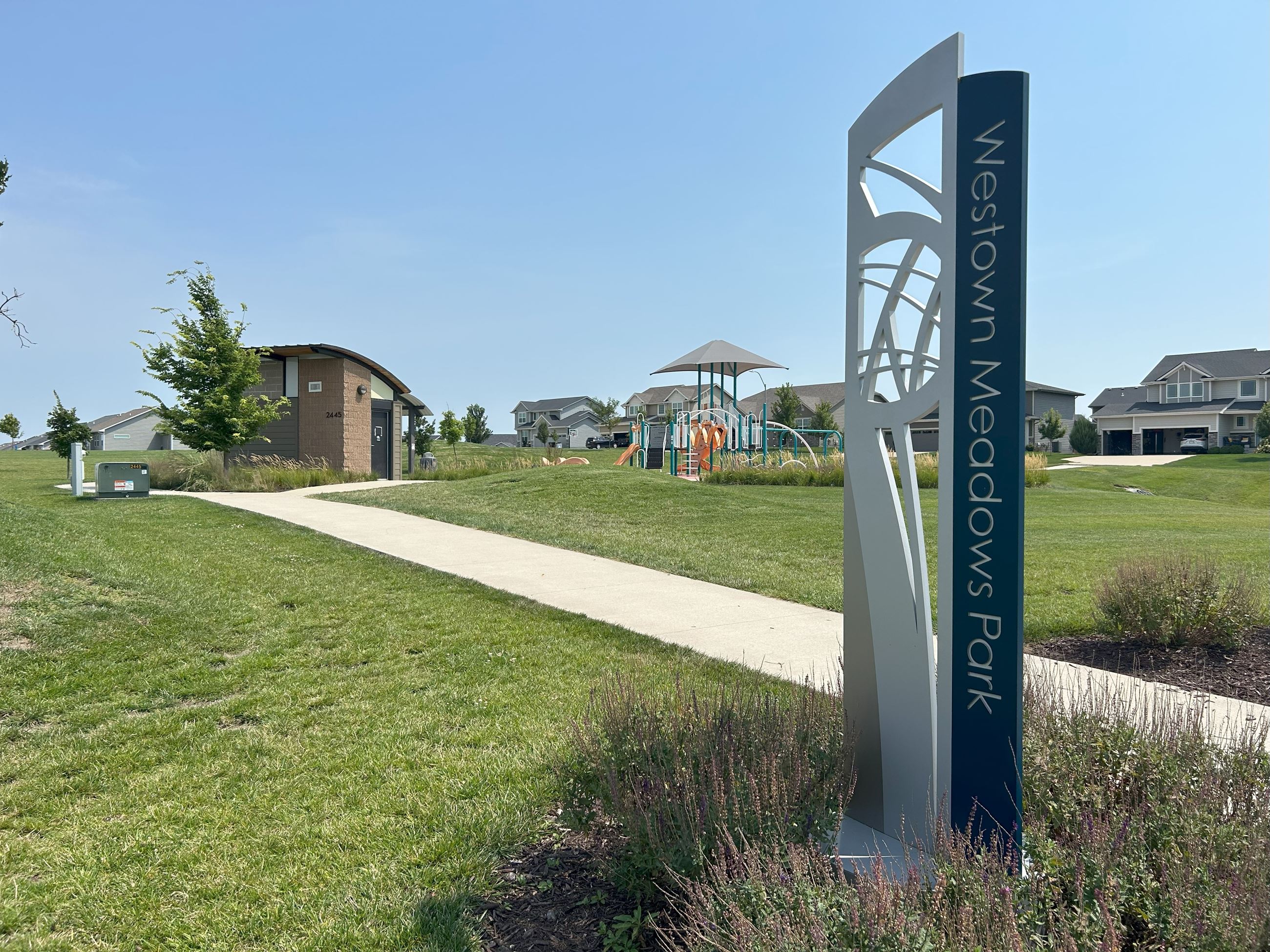 The sign leading into Westown Meadows Park.